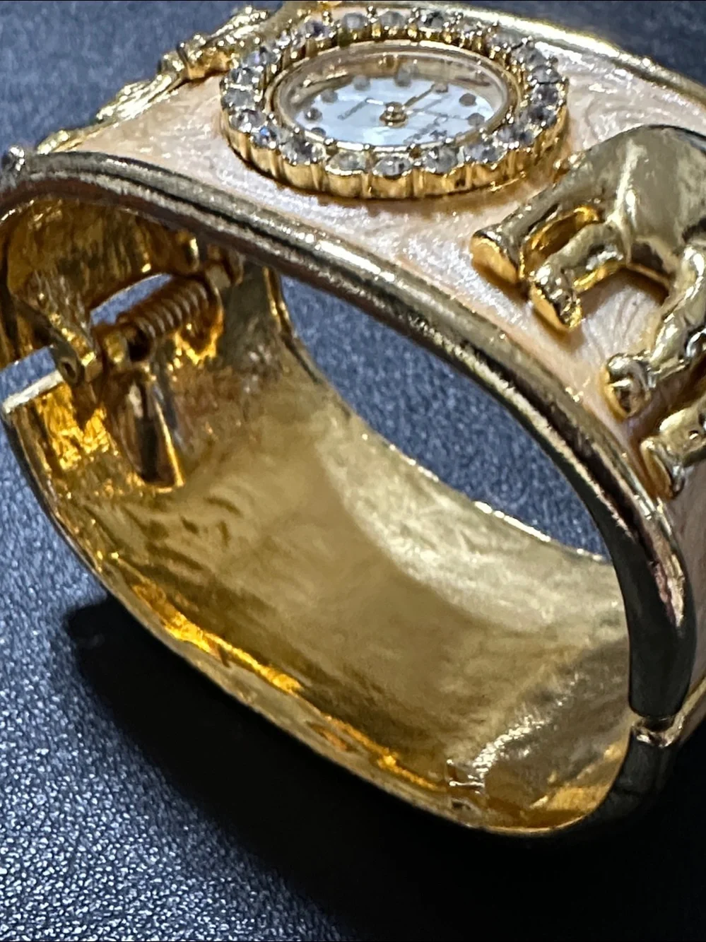 Cannes Gold Tone Elephant Hinged Enamel Clamper Bracelet Watch